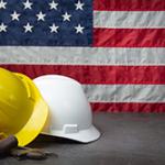 U S flag with yellow and white hard hats. West Financial Services, Inc.