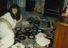 Laurie Kramer with her record collection. West Financial Services.