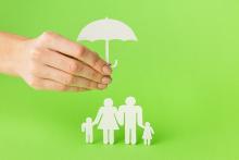 Hand holding an umbrella over a family. West Financial Services, Inc. 600x400 min