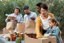 People sort through groceries