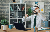 Man looking through VR. West Financial Services.
