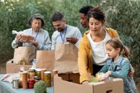 People sort through groceries