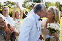 Married couple kissing after the cermony