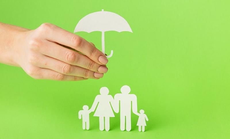 Hand holding an umbrella over a family. West Financial Services, Inc. 600x400 min