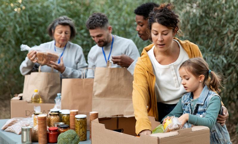 People sort through groceries